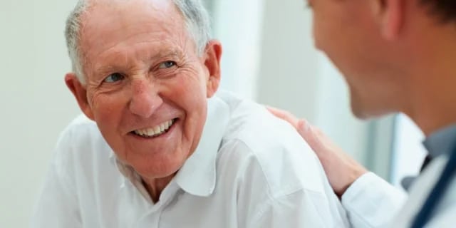 elderly man with his doctor
